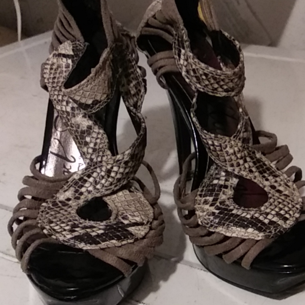 Material Girl snakeskin print platforn heels.
